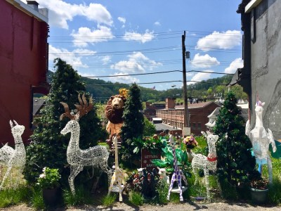 Christmas decorations in alley with view of former Westinghouse factory