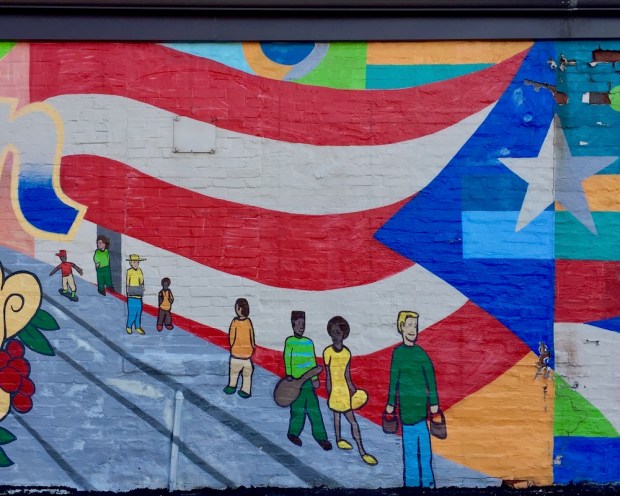 section of wall mural including American flag