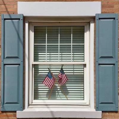 window with American flags