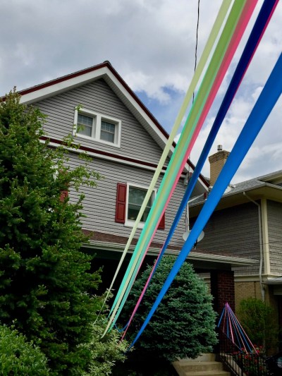 house decorated with colored streamers