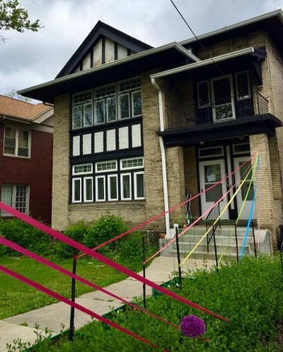 house decorated with colored streamers