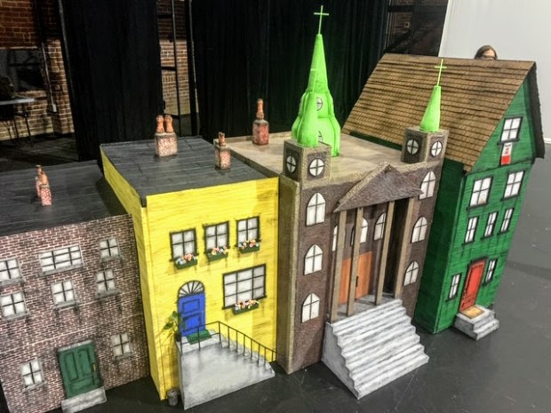 puppet stage set including four model buildings