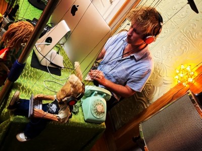 puppeteer Will Schutze working on computer