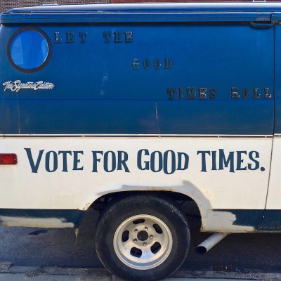 custom van decorated with the message "Let the good times roll"