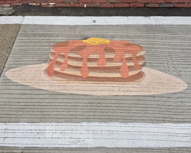 street crosswalk mural of stack of pancakes