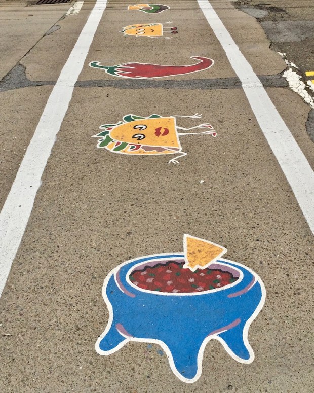 street crosswalk mural of Mexican food