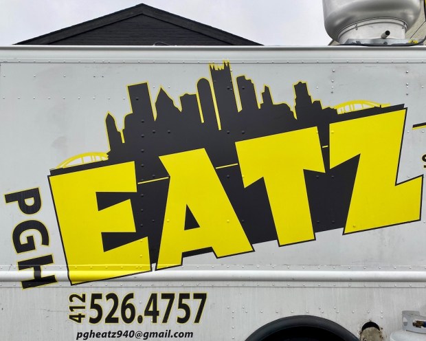 PGH EATZ food truck logo including silhouette of the Pittsburgh skyline