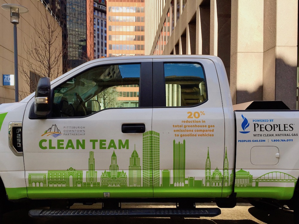 pickup truck with graphic of downtown Pittsburgh buildings