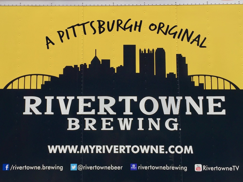 panel truck advertising Rivertown Brewing with silhouette of the downtown Pittsburgh skyline