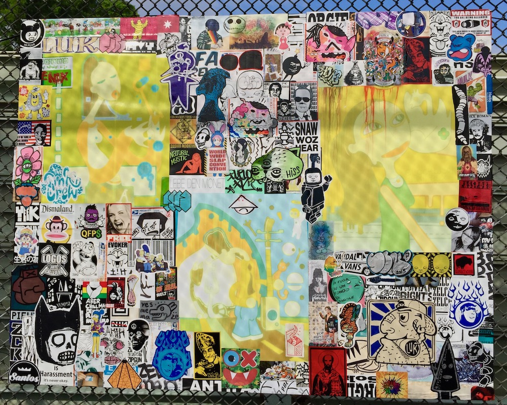 colorful collage of cartoon images, stickers, advertiments hung on chain link fence