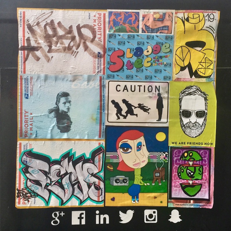 colorful collage of cartoon images, stickers, advertiments attached to utility pole