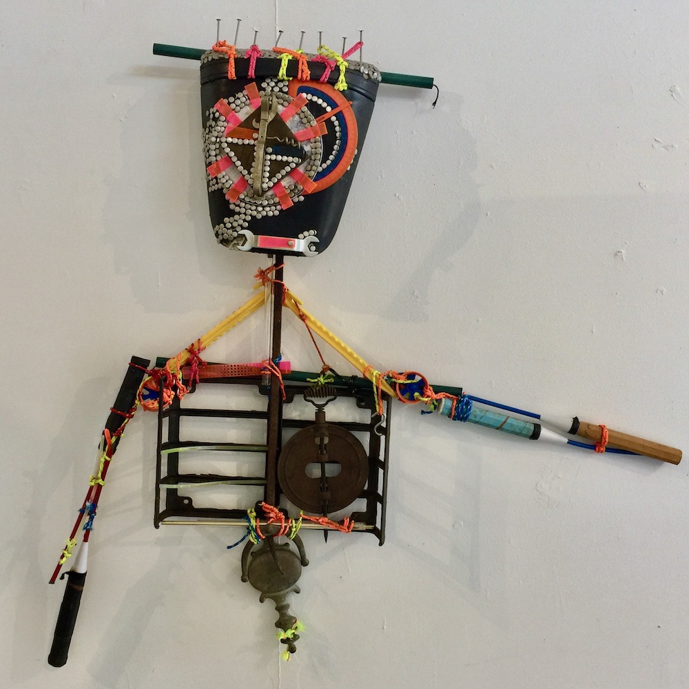 assemblage artwork by Glendon Hyde of head, arms, and torso of a figure