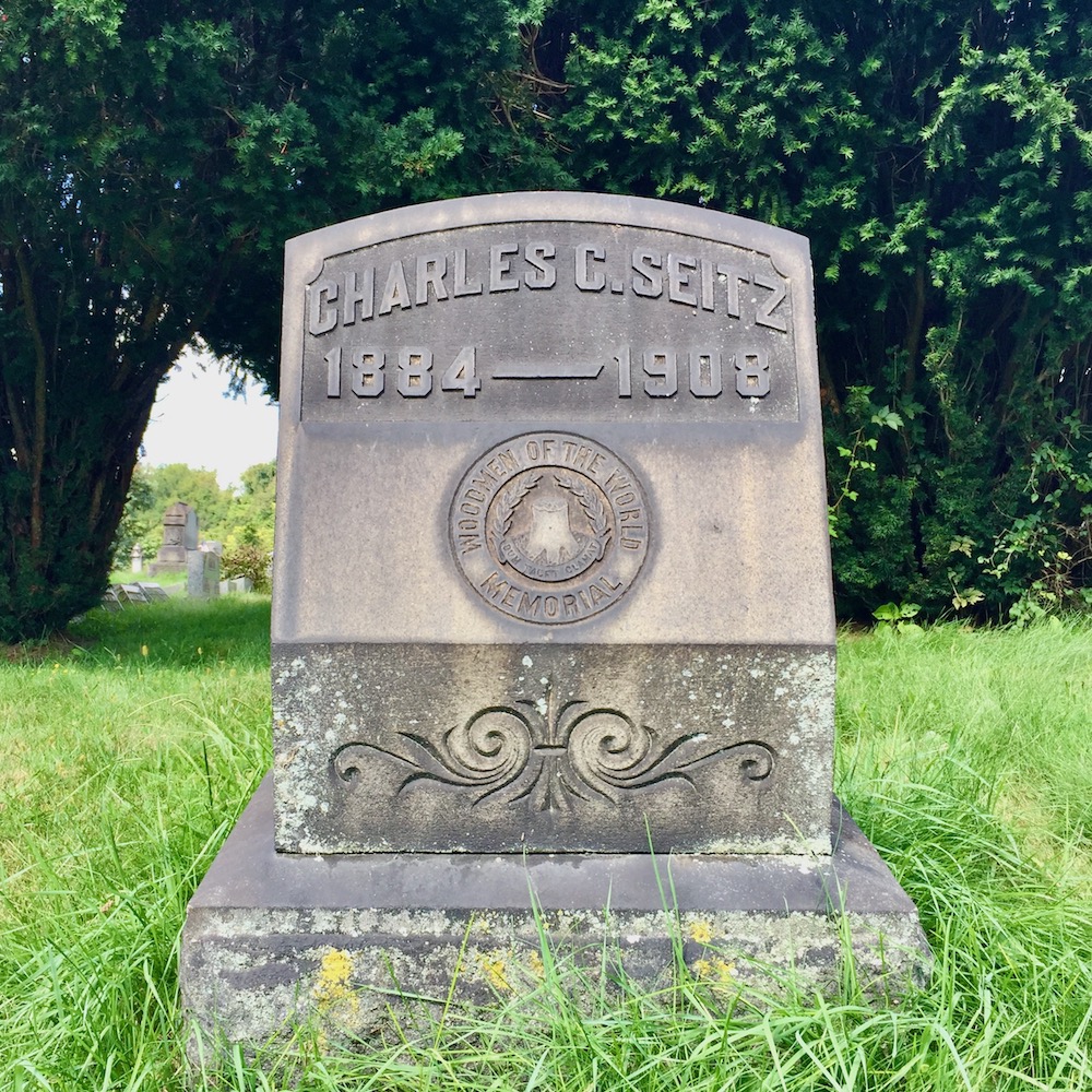 grave marker with seal of the Woodmen of the World, Richland Cemetery, Dravosburg, PA