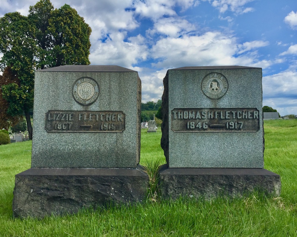 grave markers with seal of the Woodmen of the World, Richland Cemetery, Dravosburg, PA