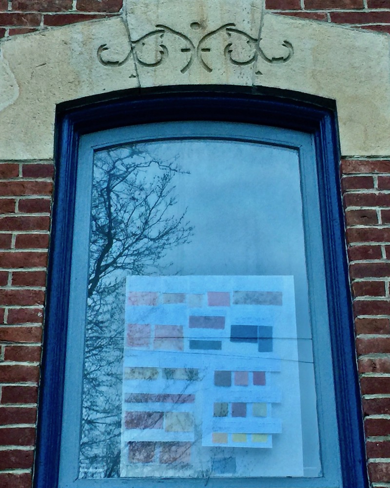 large window with display of paint chips inside