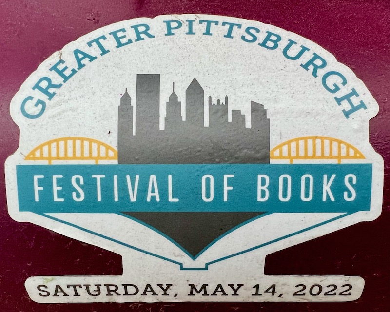 sticker for the Greater Pittsburgh Festival of Books including stylized version of downtown Pittsburgh skyline