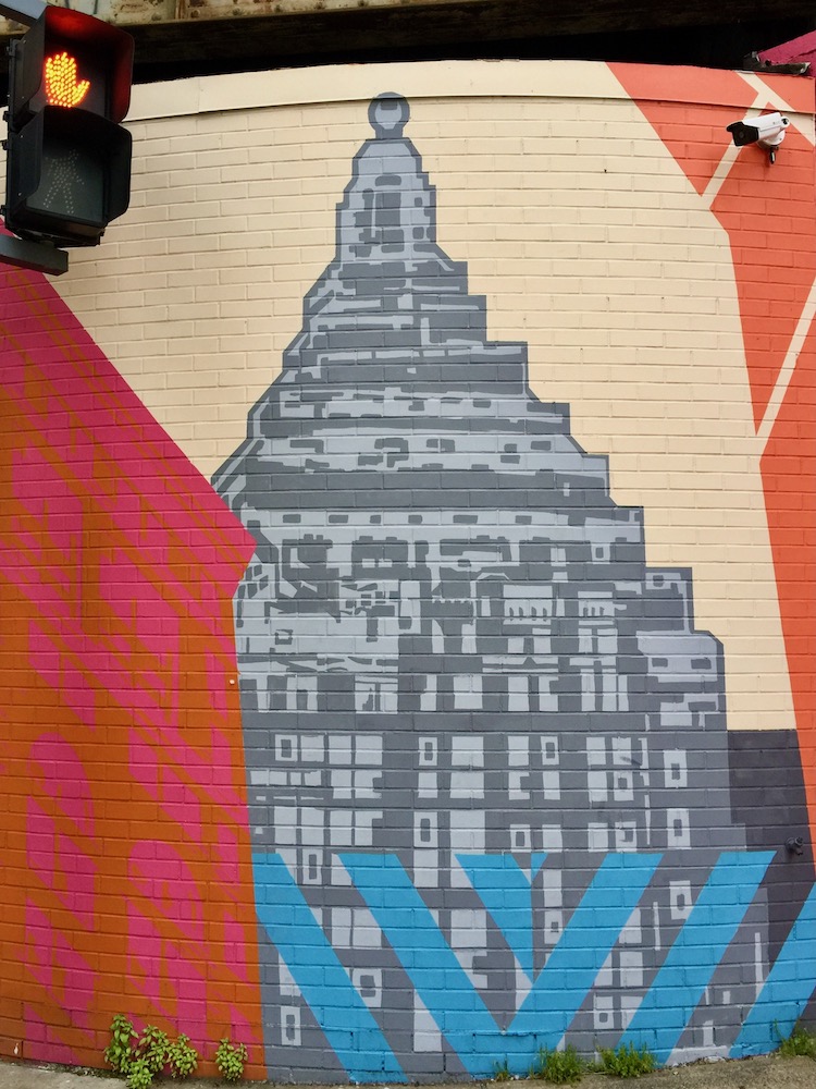 Mural of Gulf Tower on rounded brick wall