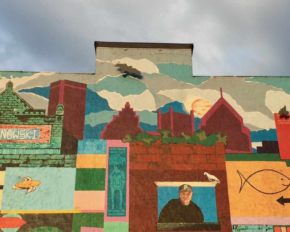 detail from mural featuring tops of downtown Pittsburgh's tallest buildings