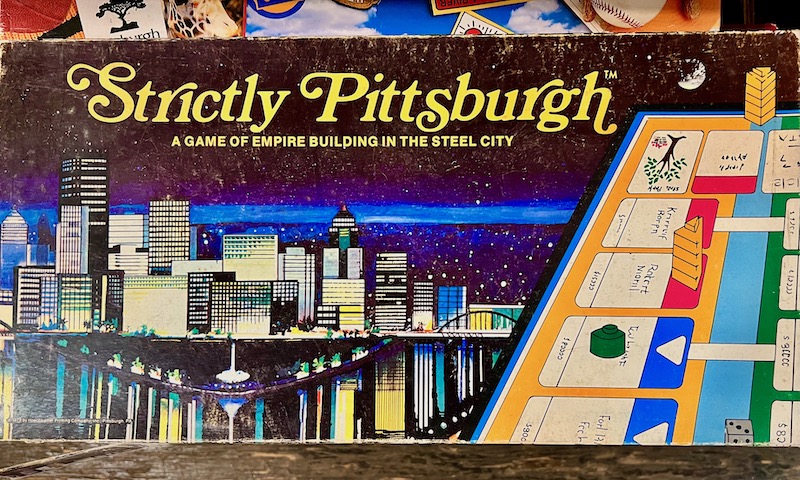 Strictly Pittsburgh board game box with illustration of downtown Pittsburgh