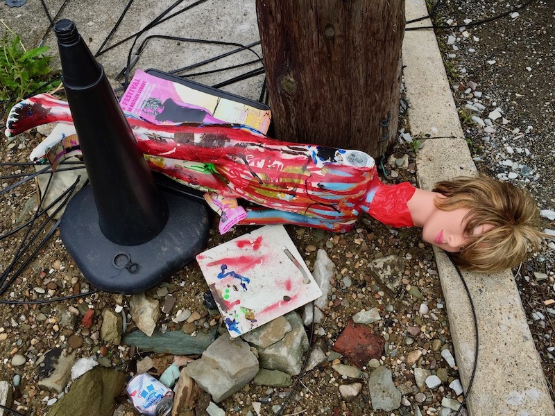 painted mannequin boy left on curbside