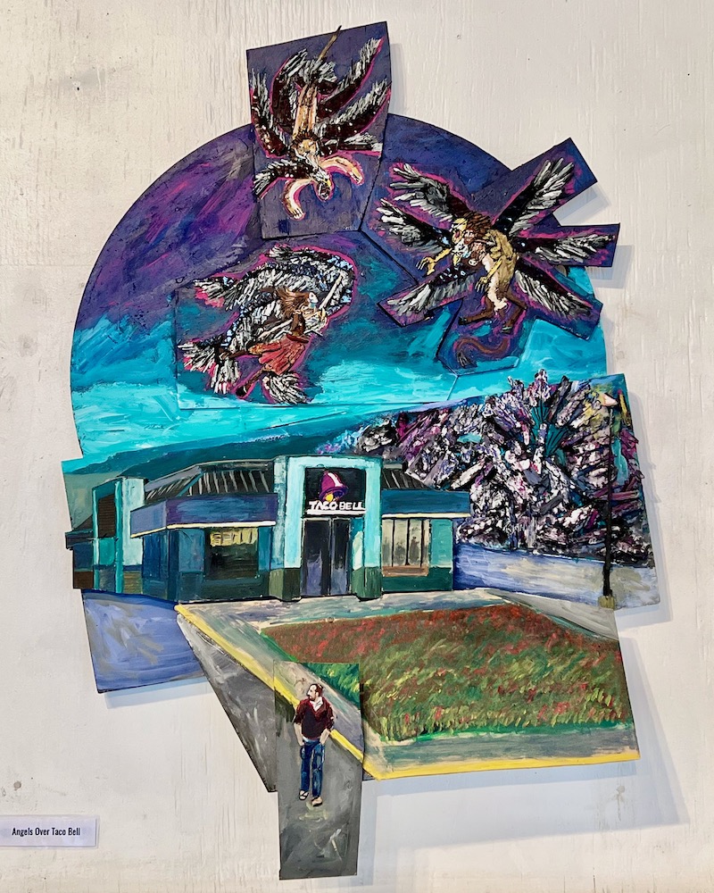 sculpture/painting by artist Nathan Van Patter of angels flying over Taco Bell restaurant