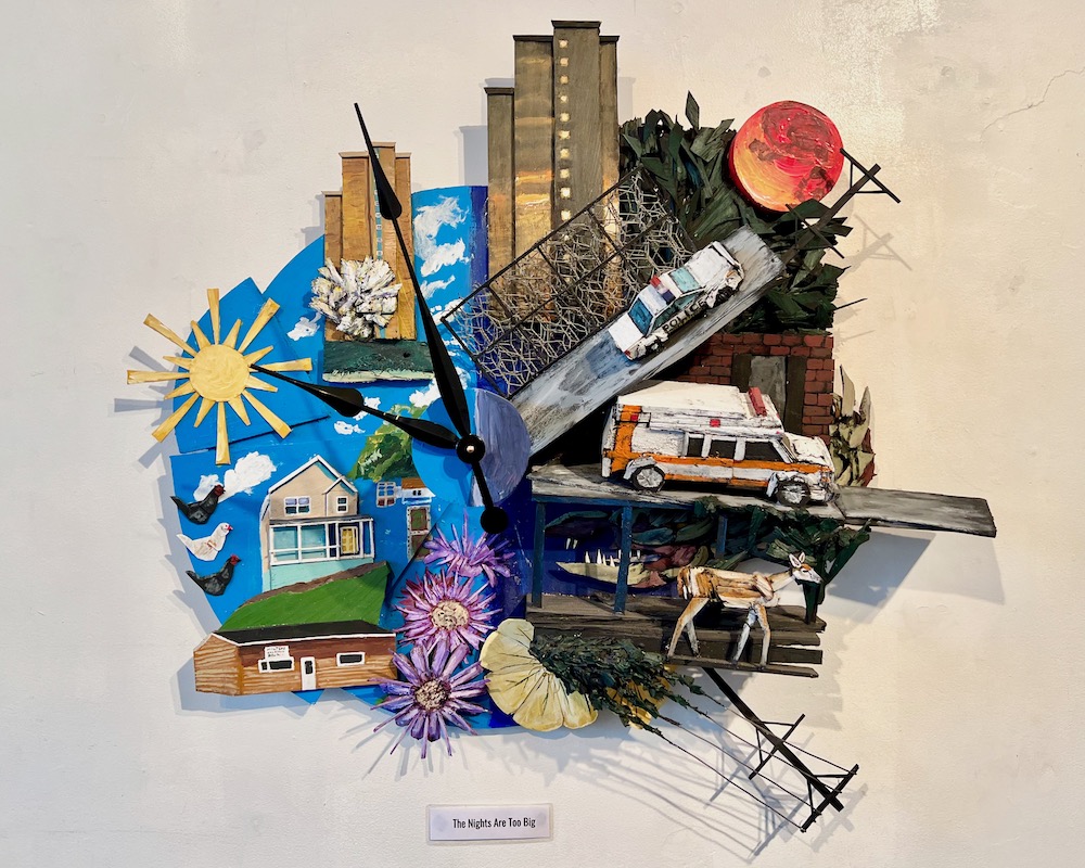 sculpture/painting by artist Nathan Van Patter featuring clock, sunshine over house, housing tower, police car, and ambulance