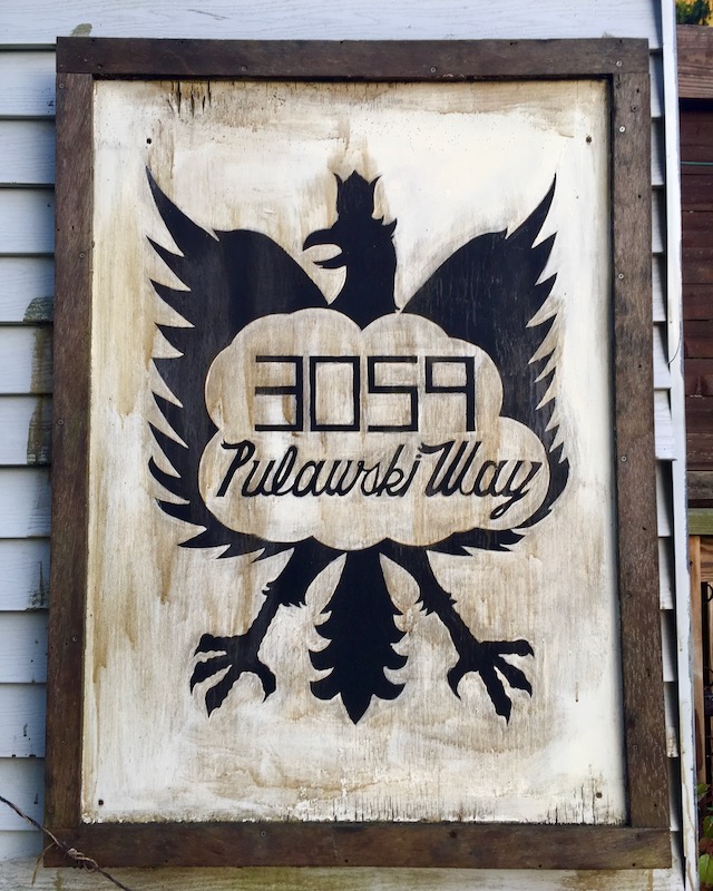 hand-painted address sign feature Polish eagle emblem