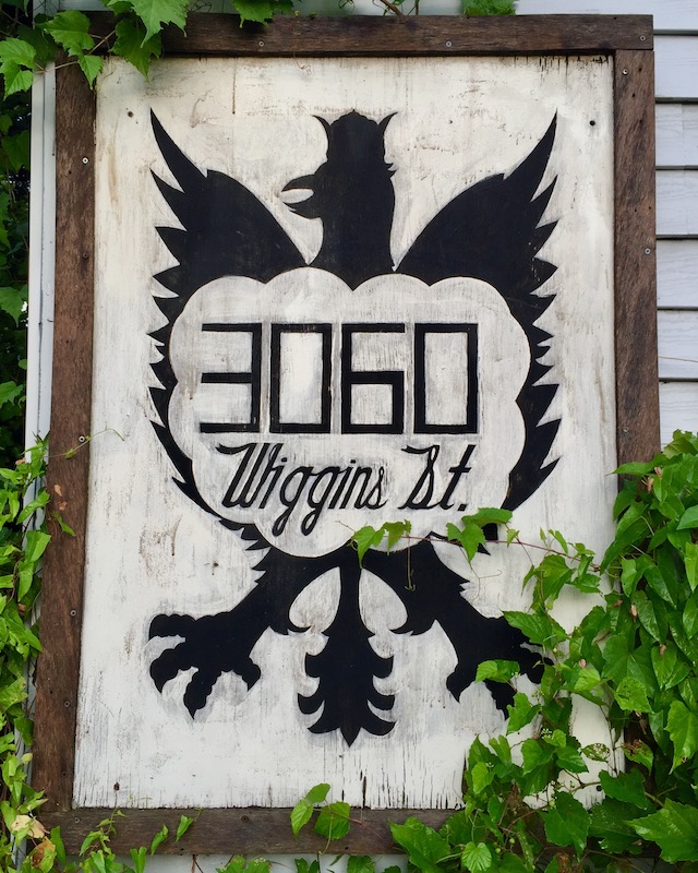 hand-painted address sign feature Polish eagle emblem