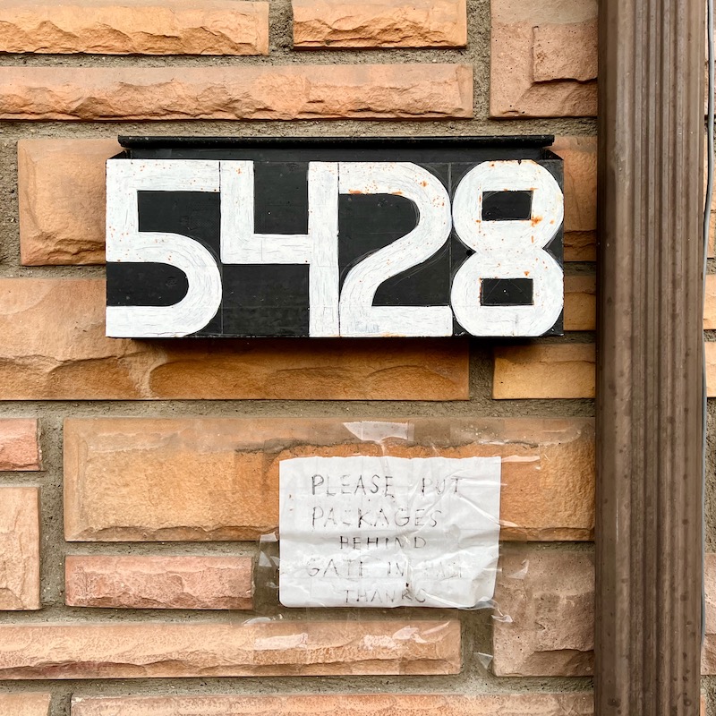 residential mailbox hand-painted with address