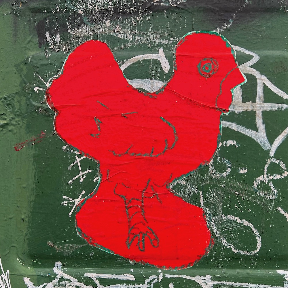 image of red rooster wheat pasted to mailbox