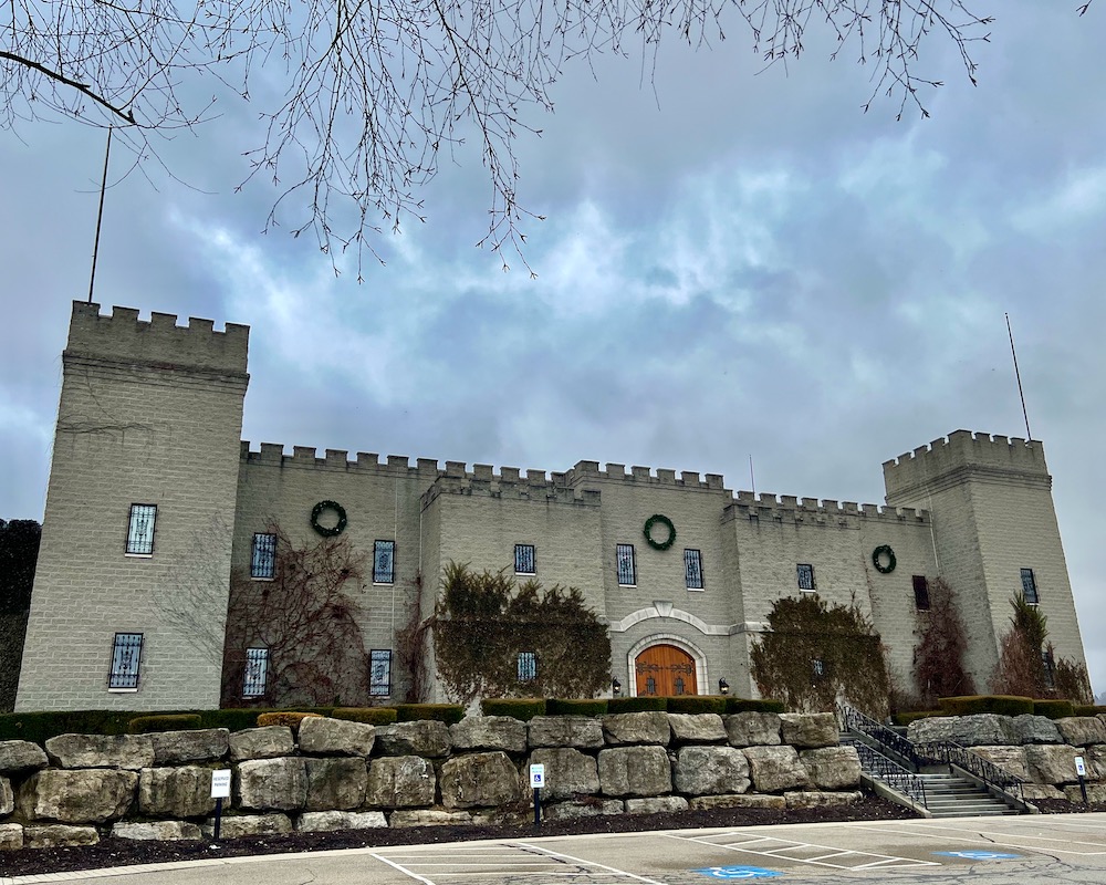 exterior of large building made to look like medieval castle
