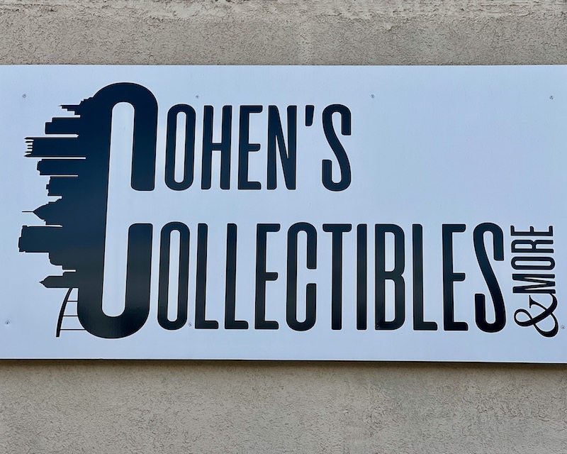 sign for retail store including skyline of downtown Pittsburgh