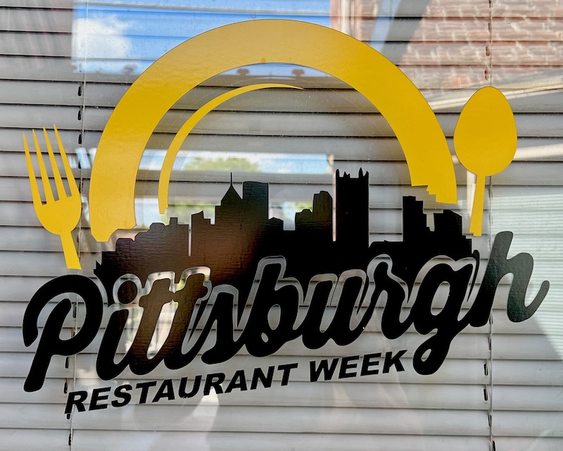 window decal with silhouette of downtown Pittsburgh skyline