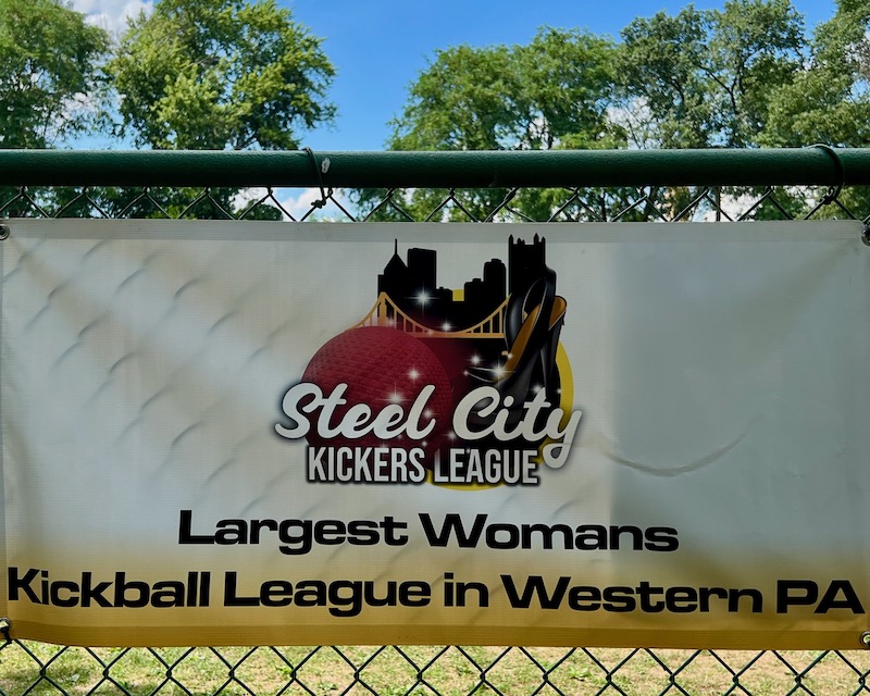 logo for kickball league including skyline of downtown Pittsburgh