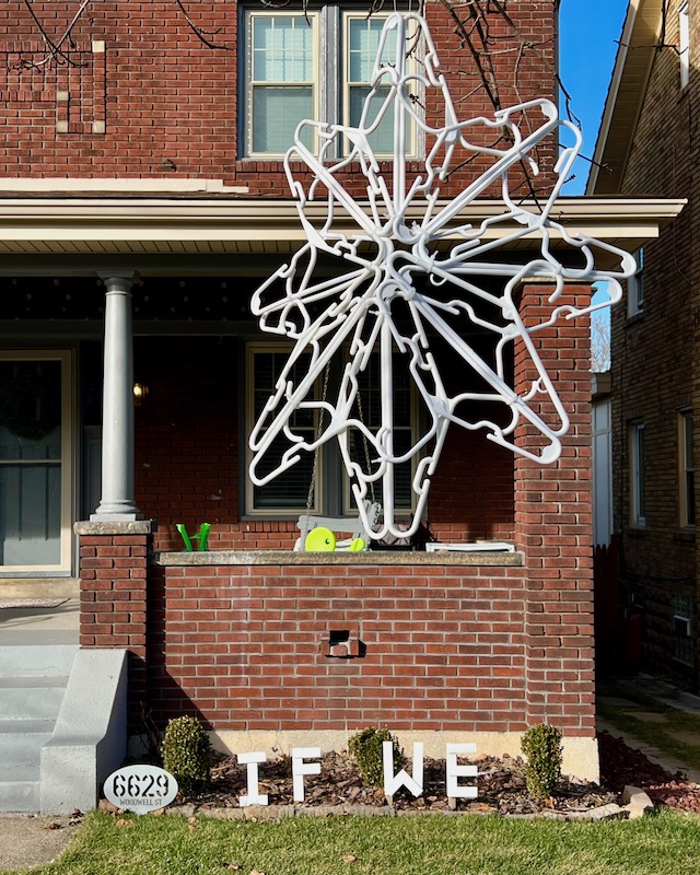 handmade letters attached to residential house reading "if we"