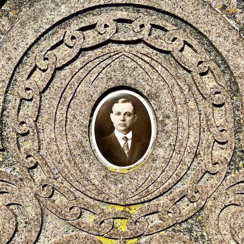 ceramic photograph inset in gravestone