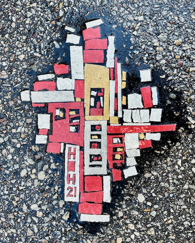 abstract street art made from cut linoleum tiles