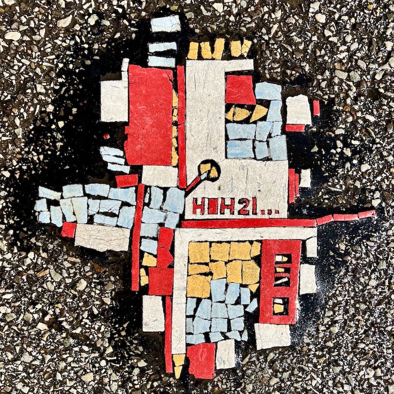 abstract street art made from cut linoleum tiles