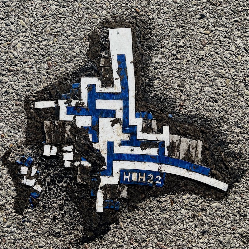 abstract street art made from cut linoleum tiles