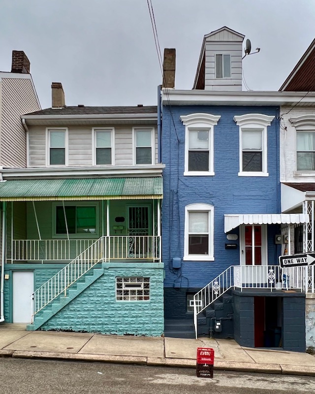 stacked milk crates holding parking spot