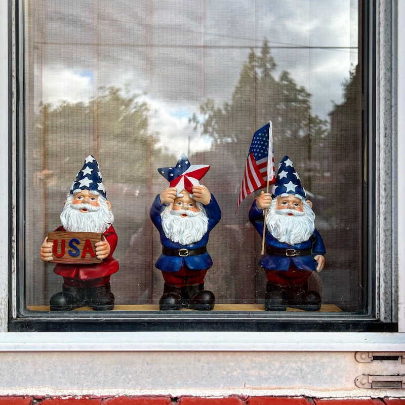 decorative gnome figurines in red, white, and blue