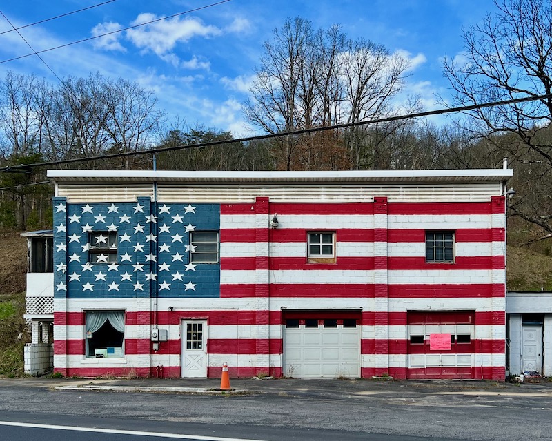 2-story garage building painted like the American flag