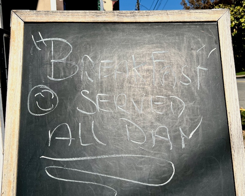 sidewalk chalk board advertising breakfast