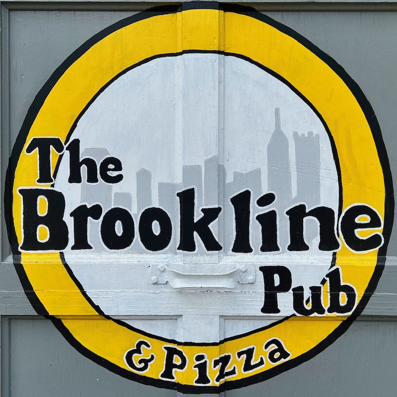 hand-painted sign for pub with skyline of downtown Pittsburgh