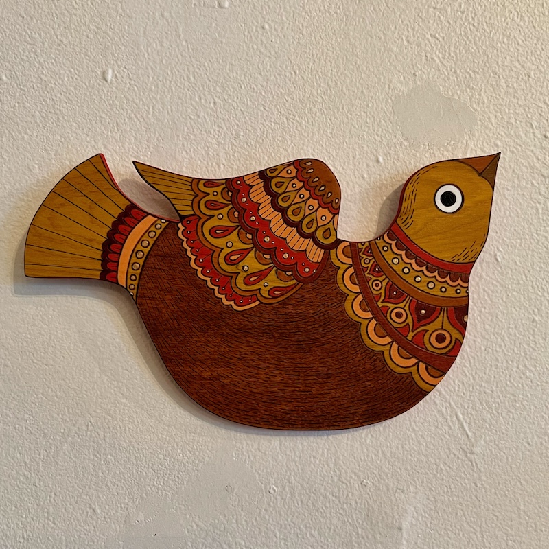 wooden bird made from cut, burned, and stained wood by artist Rachel McFarlane David